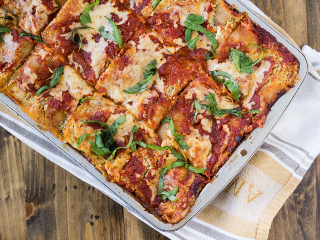 A vegetarian lasagna bursting with flavor from summer squash, basil pesto ricotta, and a homemade tomato sauce | http://veggieandthebeastfeast.com