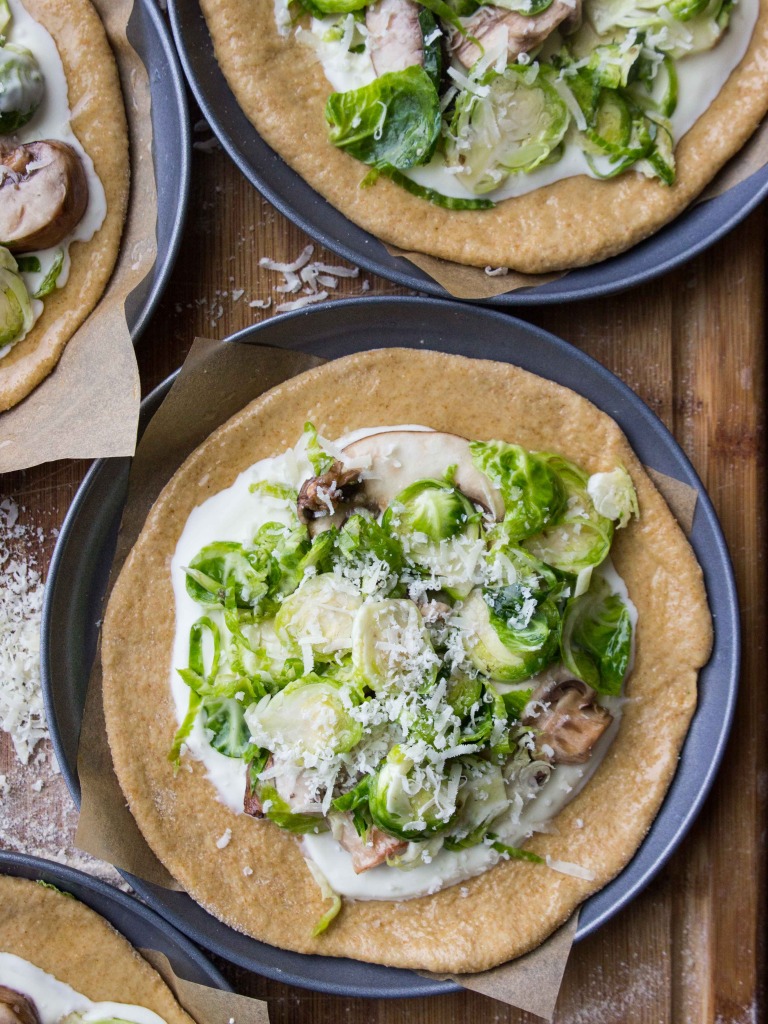 Brussels Sprout, Mushroom and Creme Fraiche Pizzas // veggieandthebeastfeast.com