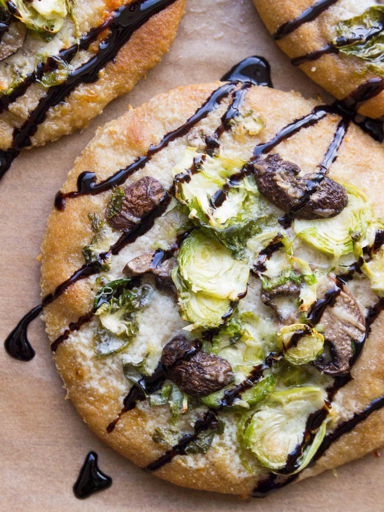 Brussels Sprout, Mushroom and Creme Fraiche Pizzas // veggieandthebeastfeast.com