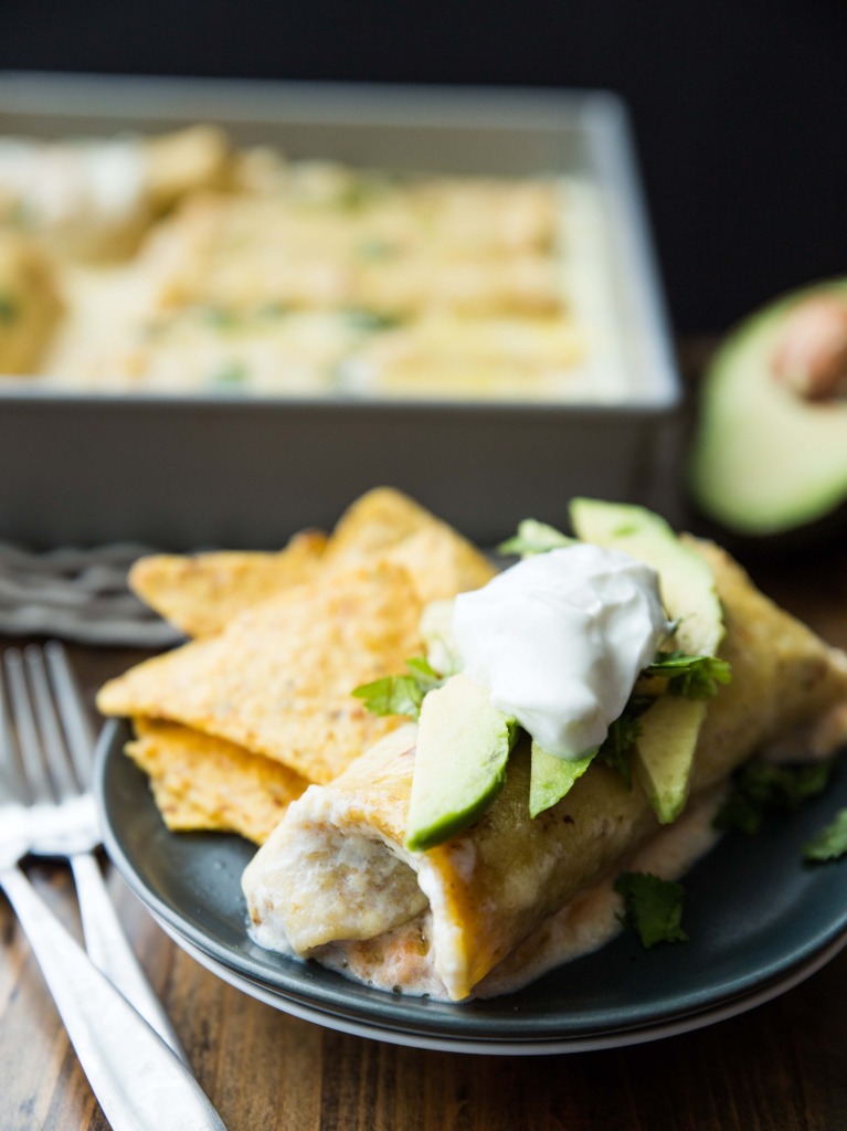 High Protein Sweet Potato, Pinto and Black Bean Enchiladas with White Cheddar Sauce // veggieandthebeastfeast.com