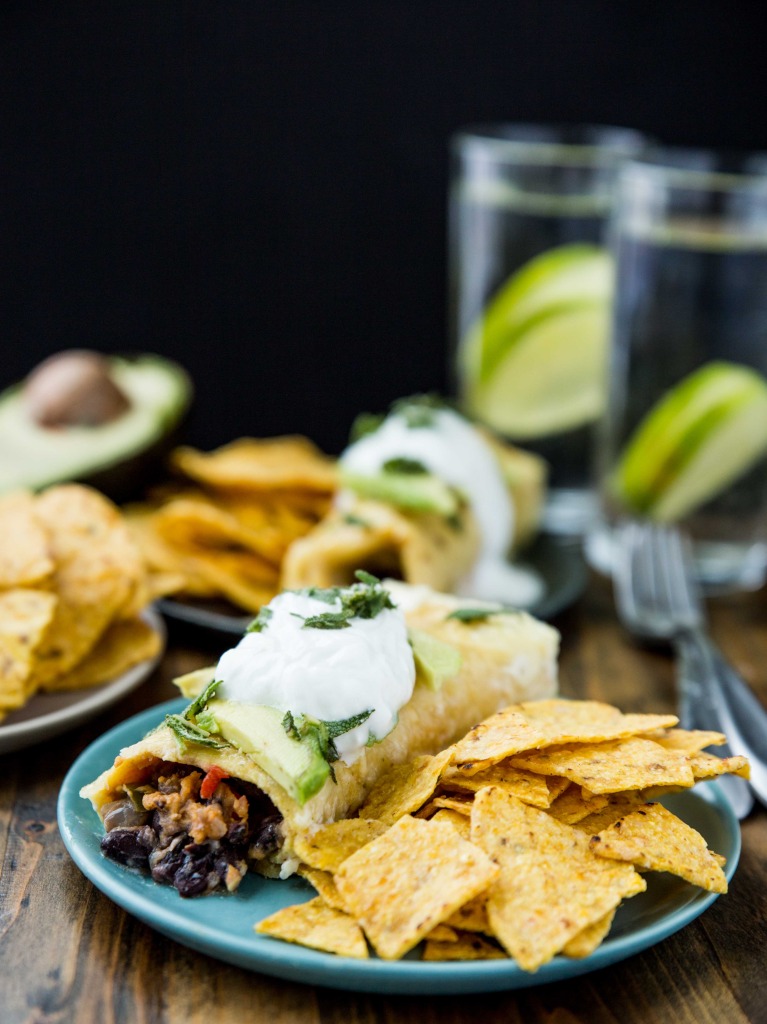 High Protein Sweet Potato, Pinto and Black Bean Enchiladas with White Cheddar Sauce // veggieandthebeastfeast.com