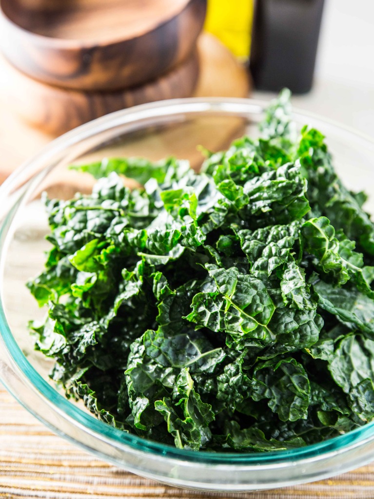 Warm Kale Salad with Goat Cheese, Pine Nuts and Sweet Onion Balsamic Dressing // veggieandthebeastfeast.com