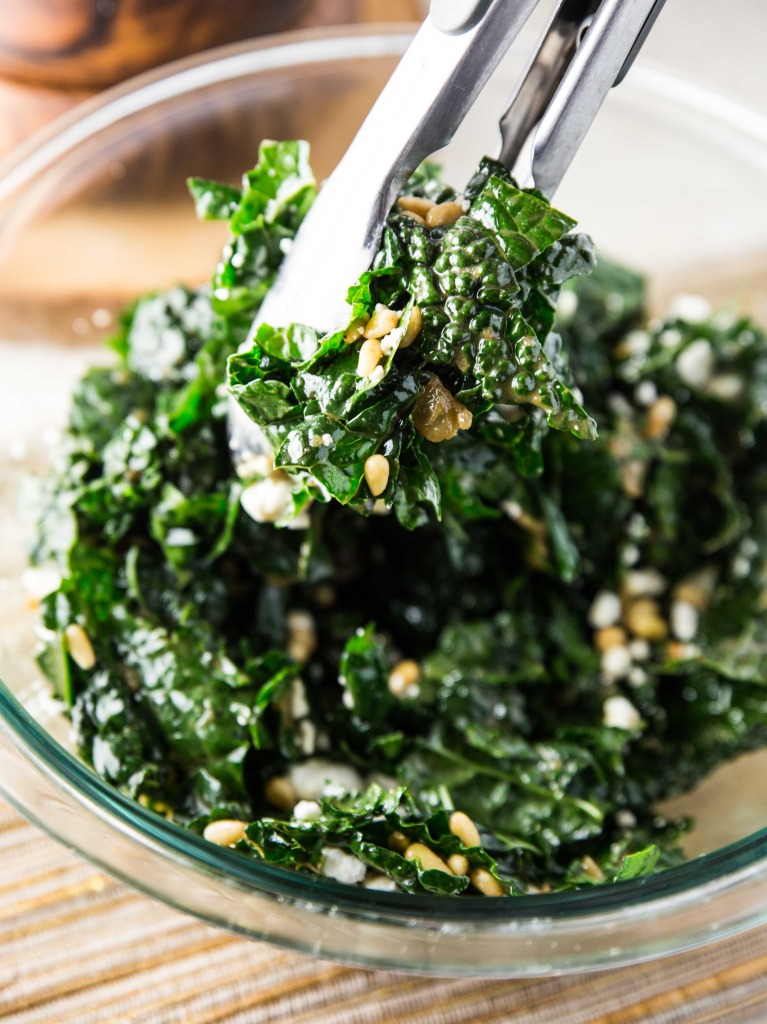 Warm Kale Salad with Goat Cheese, Pine Nuts and Sweet Onion Balsamic Dressing // veggieandthebeastfeast.com