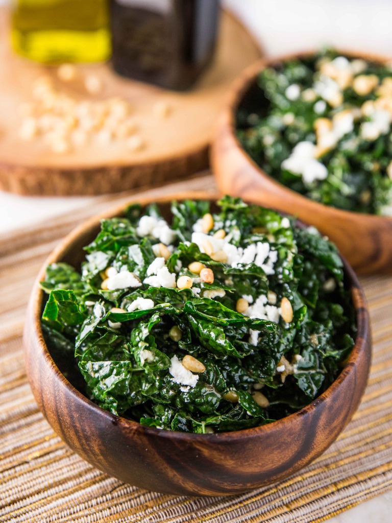 Warm Kale Salad with Goat Cheese, Pine Nuts and Sweet Onion Balsamic Dressing // veggieandthebeastfeast.com