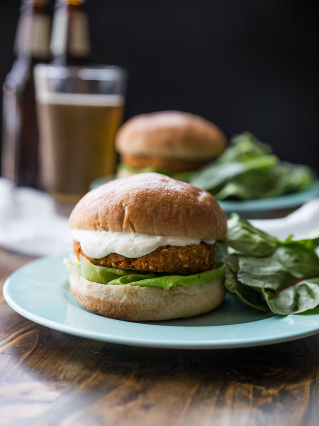 Buffalo Chickpea Sweet Potato Burgers with Whipped Feta Garlic Sauce // @veggiebeastblog