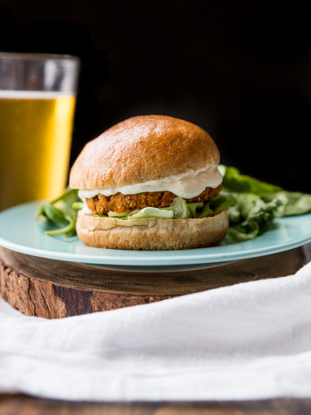 Buffalo Chickpea Sweet Potato Burgers with Whipped Feta Garlic Sauce // @veggiebeastblog