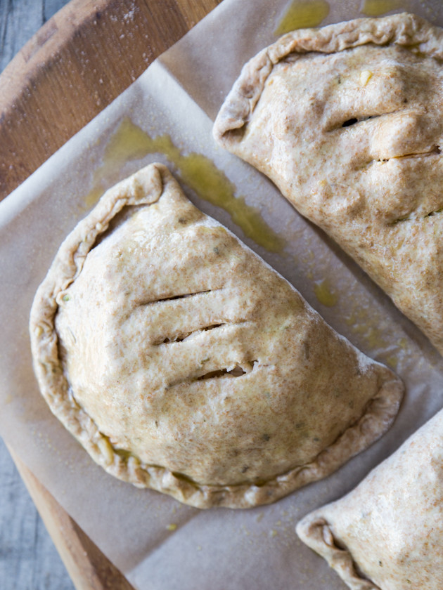 Roasted Broccoli and Smoked Gouda Calzones - homemade whole wheat beer crust, my favorite pizza sauce, and melty cheese! Comfort food at its finest.