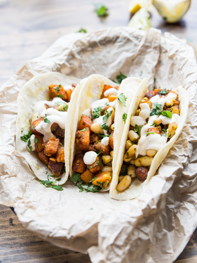 Curried Butternut and White Bean Tacos - lightly sweet, spicy, butternut squash with lemon parsley white beans and a smooth cashew cream #vegan #glutenfree