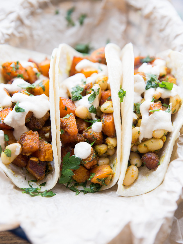 Curried Butternut and White Bean Tacos - lightly sweet, spicy, butternut squash with lemon parsley white beans and a smooth cashew cream #vegan #glutenfree