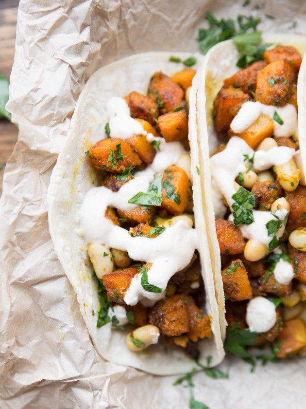 Curried Butternut and White Bean Tacos - lightly sweet, spicy, butternut squash with lemon parsley white beans and a smooth cashew cream #vegan #glutenfree