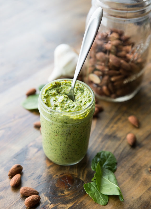 Almond Arugula Spinach Pesto - a simple springtime pesto that comes together quickly, and adds tons of flavor to sandwiches, salads, pizza, and more!