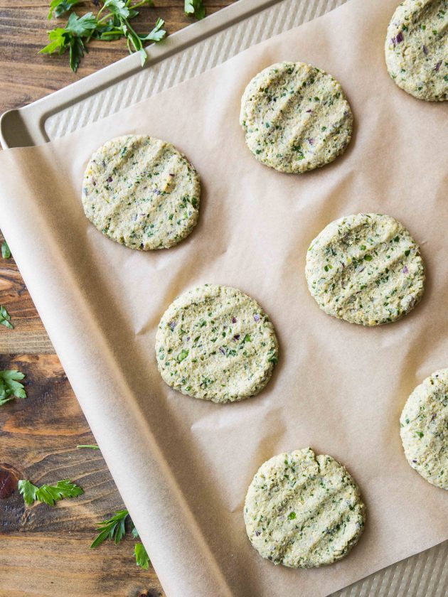 Easy vegan and gluten free falafel patties that are lightly pan-friend to golden brown, and drizzled with a quick tahini dill dressing.